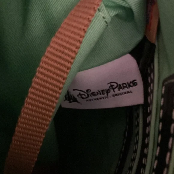 Dooney & Bourke Disney Parks Haunted Mansion MadamPurple Patterned Crossbody Bag - Picture 12 of 16